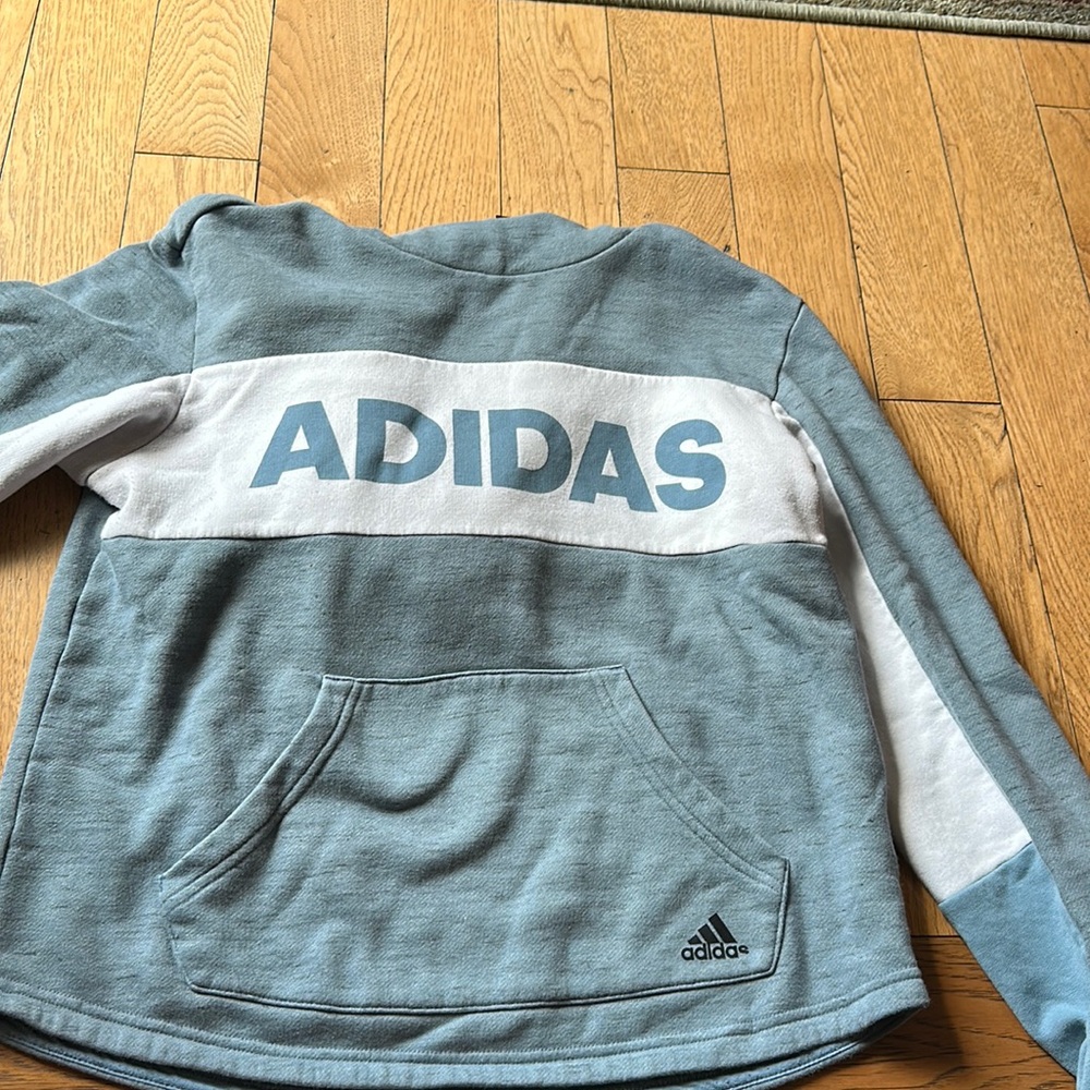 Woman’s small blue hoodie.